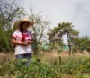 Josefina Santiago in her agroecological farm where she crops maize, beans, and pumpkins close to the water pans. El Porvenir, San José del Progreso, Oaxaca, Mexico, May 2022, Monica Pelliccia