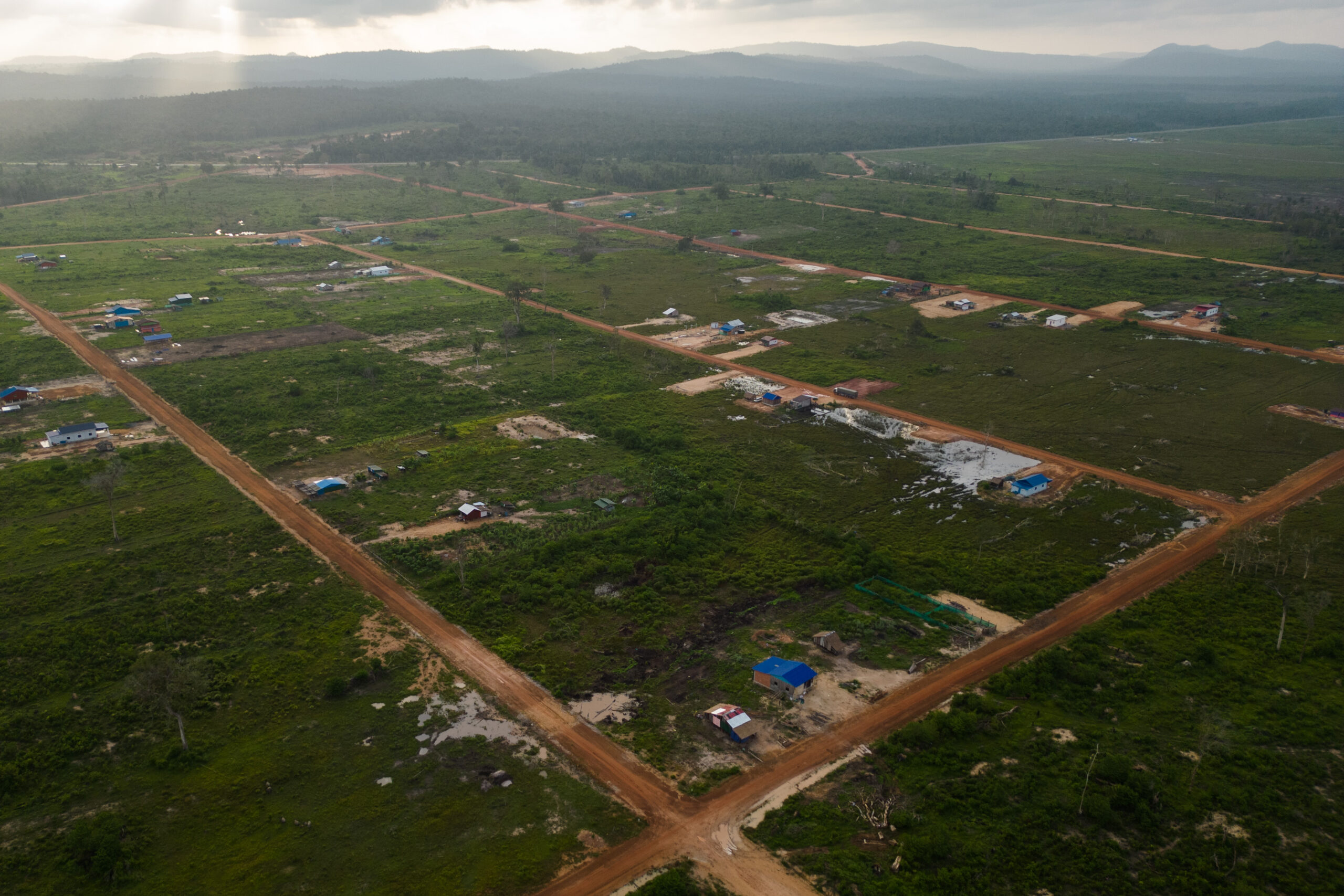 As of May 2023, when reporters visited the UDG relocation site for a second time, residents complained that the basic amenities promised by authorities as part of the relocation package had still not materialized. Photo by Gerald Flynn/Mongabay.